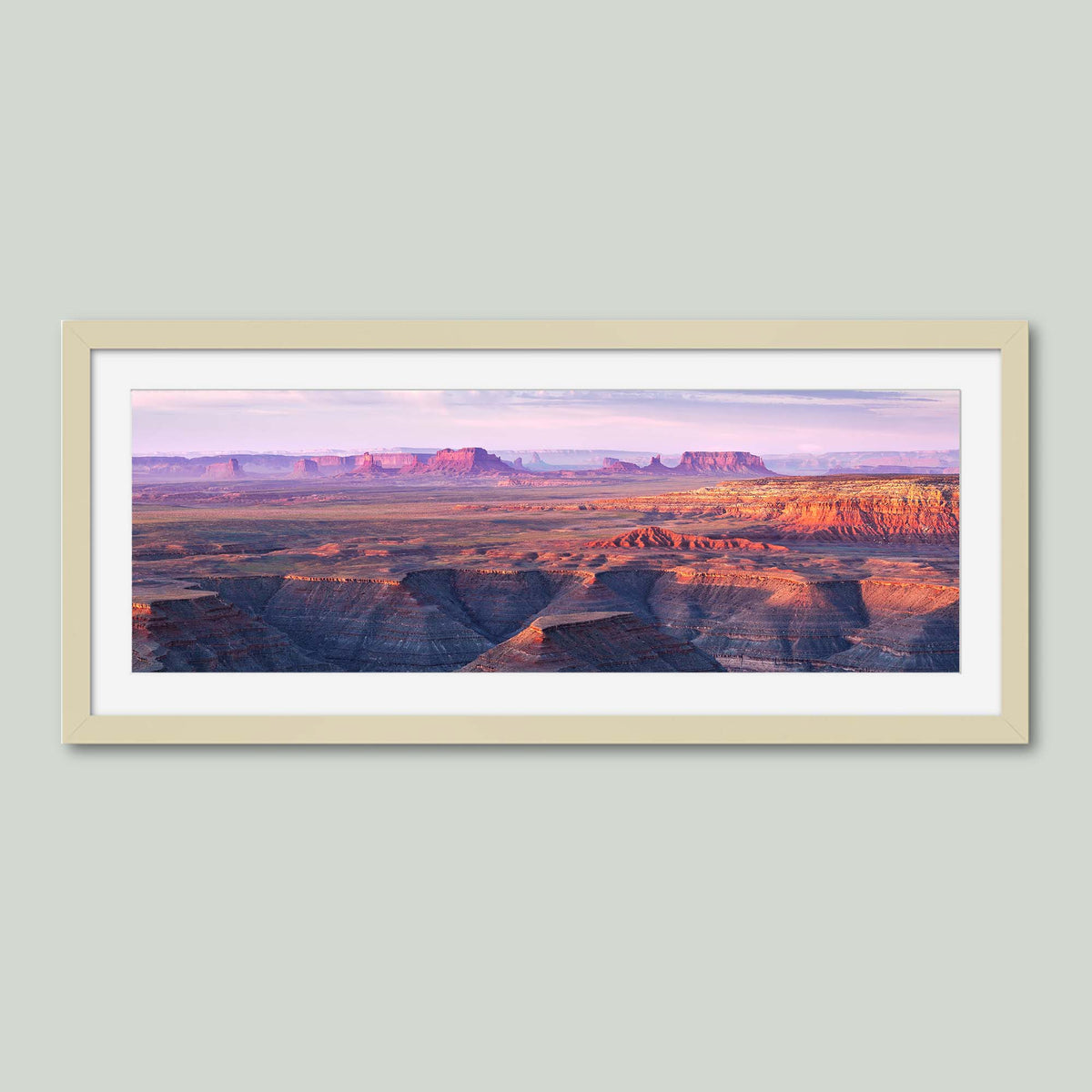 Muley Point, sunrise over the San Juan River canyons with Monument Valley in the distance, from Muley Point in Utah, in a maple frame with a white mat