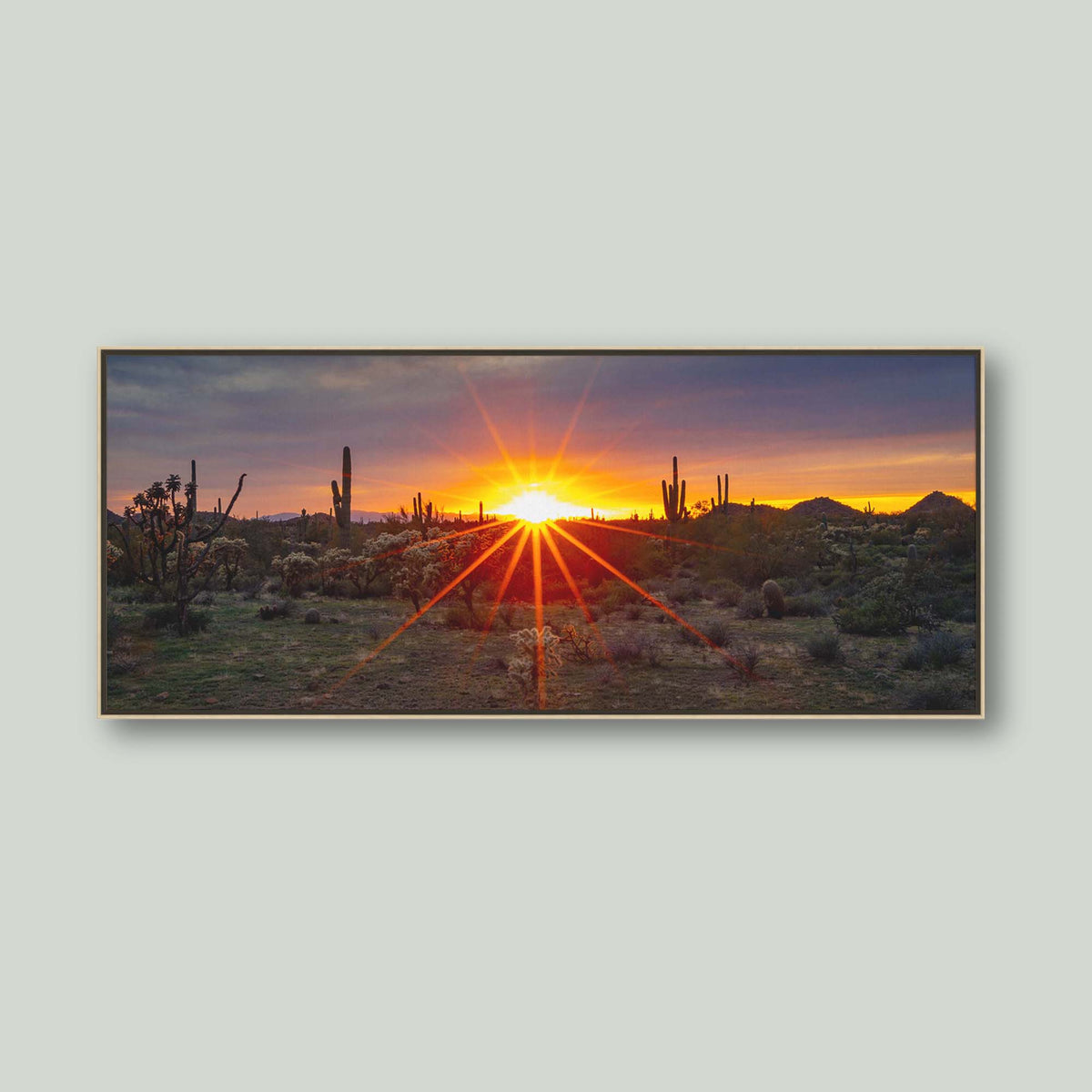Where the Desert Exhales, a sunset sunburst over saguaro and cholla cacti in the Sonoran Desert of Arizona, as a canvas in a maple floating frame
