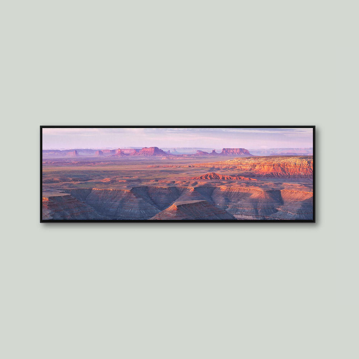 Muley Point, sunrise over the San Juan River canyons with Monument Valley in the distance, from Muley Point in Utah, as a canvas in a black floating frame