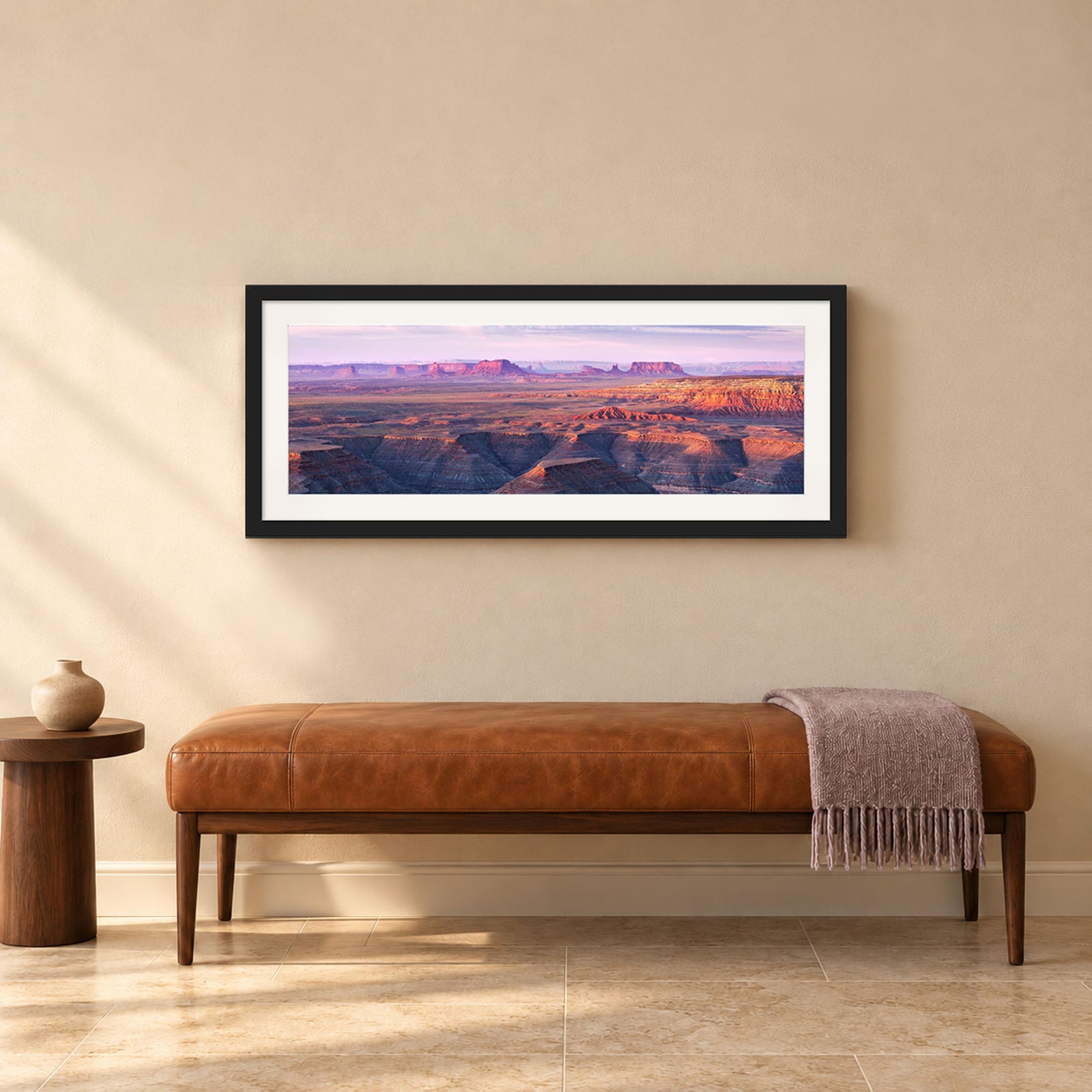 Muley Point, sunrise over the San Juan River canyons with Monument Valley in the distance, Utah, in a black frame shown in a home setting